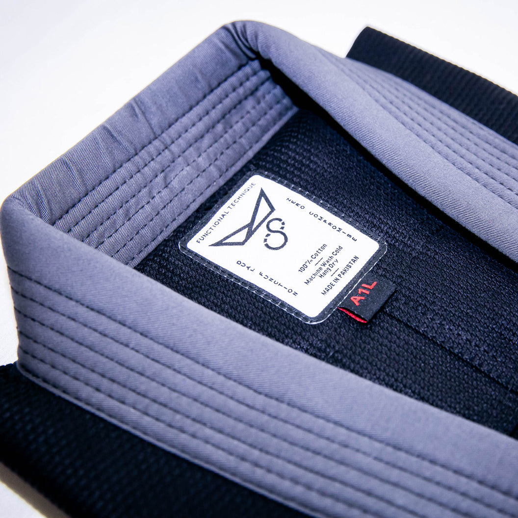 Brazilian jiu jitsu gi by Functional Technique. Black and charcoal